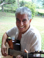 Ariel Kalma playing guitar